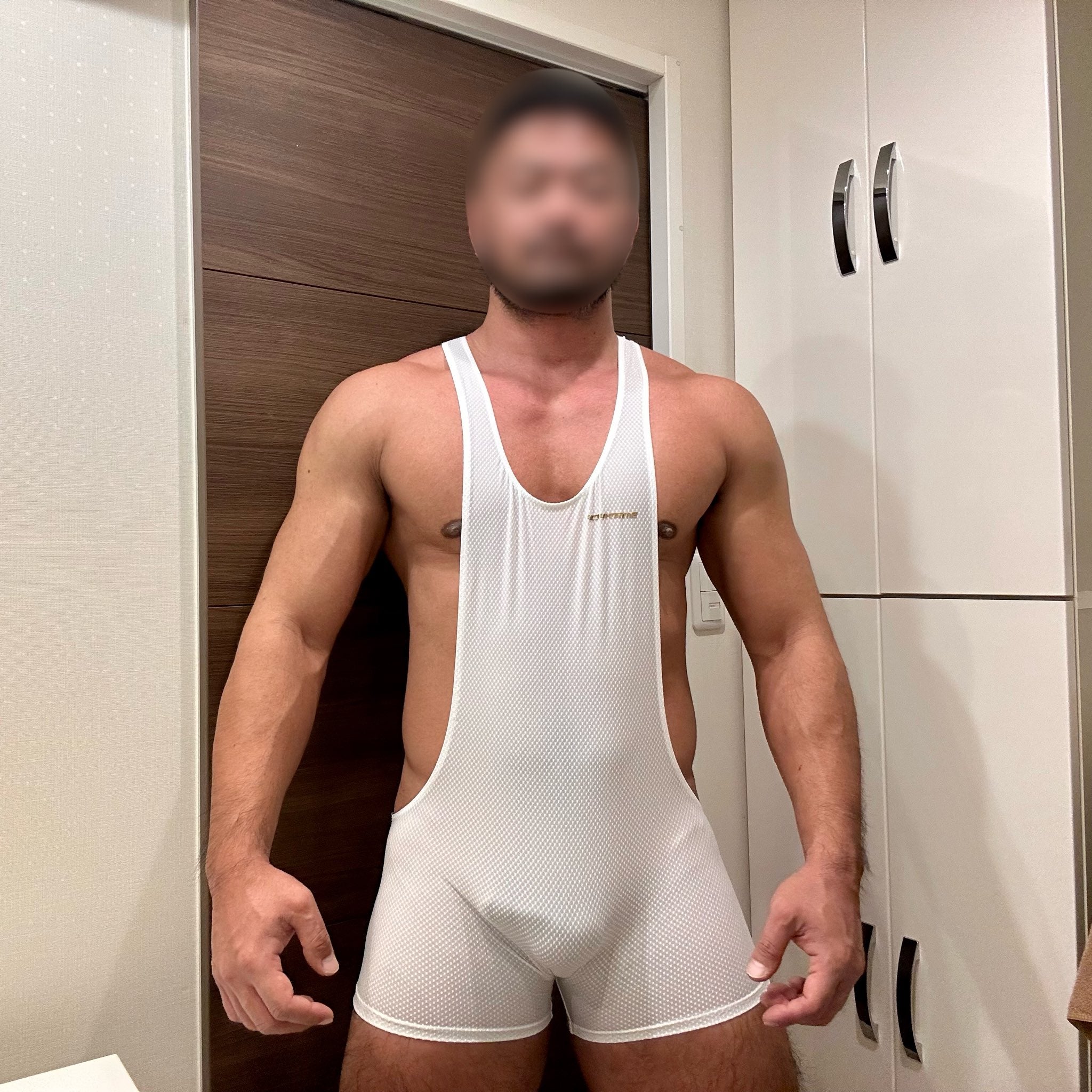 a sexy gay man in wear sexy gay wrestling singlet from Pridevoyageshop