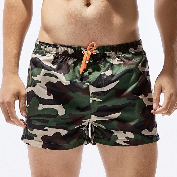 a sexy man in sexy gay camo wear from Pridevoyageshop