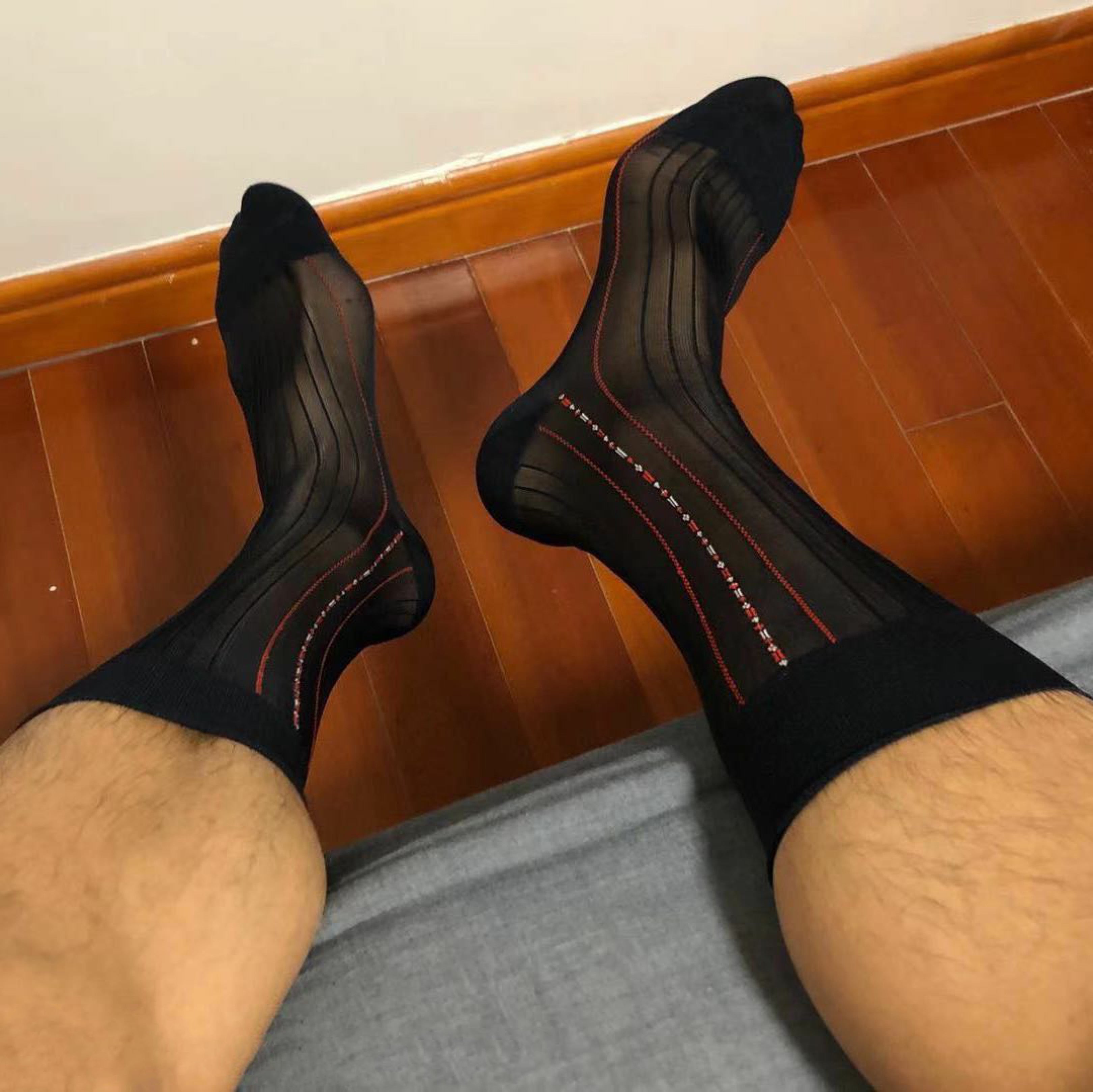 a sexy man in sexy gay sheer socks from Pridevoyageshop