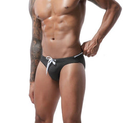 hot gay man in black Gay Swimwear | Men's Bold Bowtie Swim Briefs- pridevoyageshop.com - gay men’s underwear and swimwear