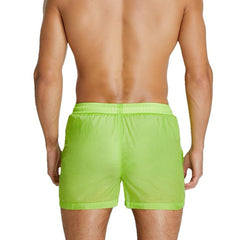 sexy gay man in green Gay Beachwear | Men's Transparent Board Shorts with Pockets - pridevoyageshop.com - gay men’s underwear and swimwear