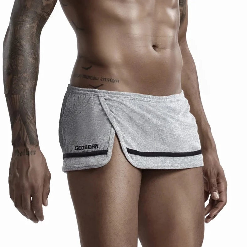 a hot gay man in gray Men's Running Shorts with Hidden Briefs - pridevoyageshop.com - gay men’s underwear and swimwear