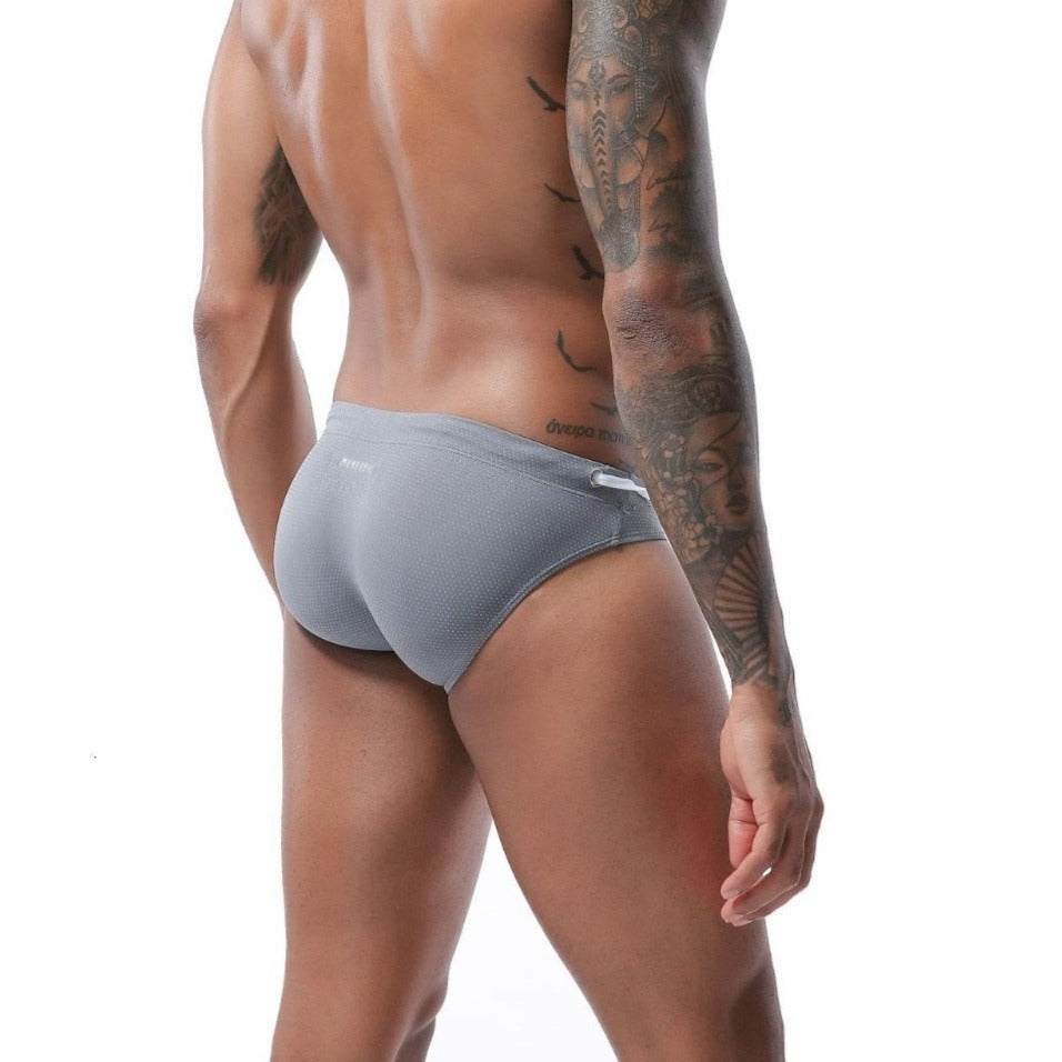 hot gay man in gray Gay Swimwear | Men's Bold Bowtie Swim Briefs- pridevoyageshop.com - gay men’s underwear and swimwear