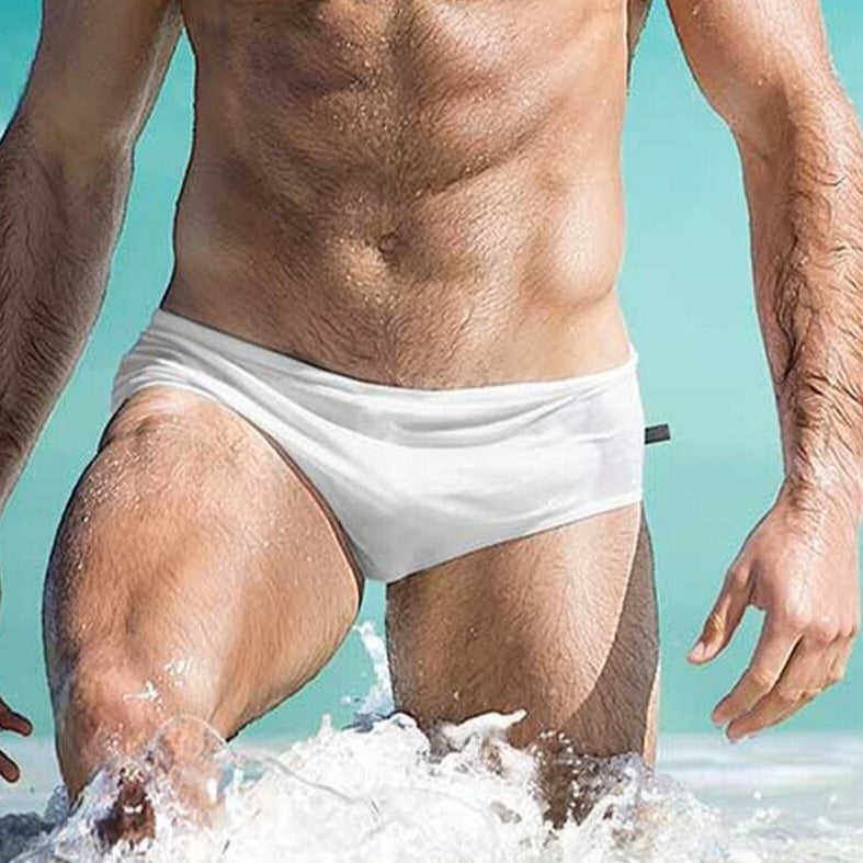 sexy gay man in white Gay Swimwear | Men's Bold Solid Swim Briefs- pridevoyageshop.com - gay men’s underwear and swimwear