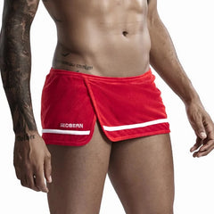 a hot gay man in red Men's Running Shorts with Hidden Briefs - pridevoyageshop.com - gay men’s underwear and swimwear