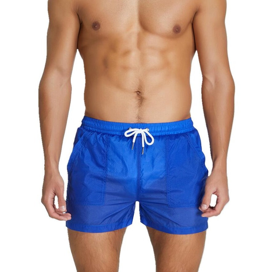 sexy gay man in blue Gay Beachwear | Men's Transparent Board Shorts with Pockets - pridevoyageshop.com - gay men’s underwear and swimwear