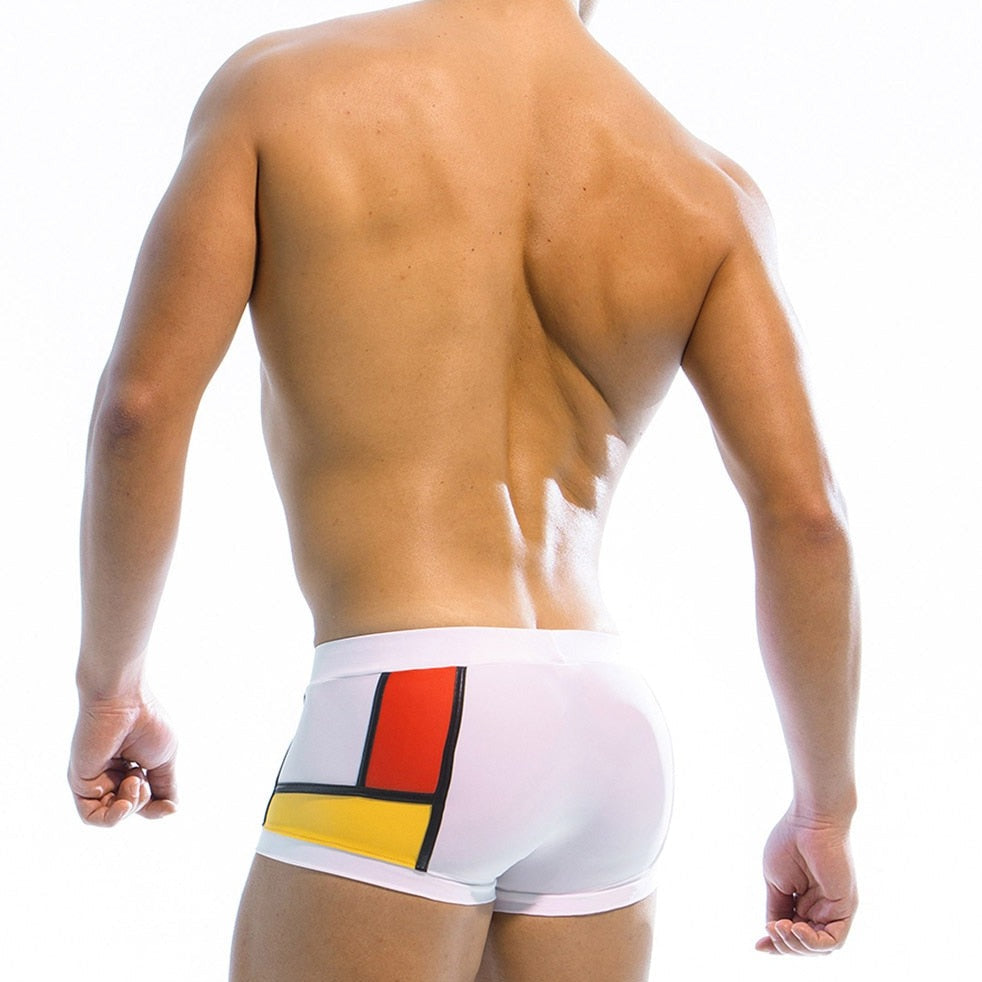hot gay hunk in white Gay Swimwear & Beachwear | Piet Mondrian Art Deco Swim Trunks - pridevoyageshop.com - gay men’s underwear and swimwear