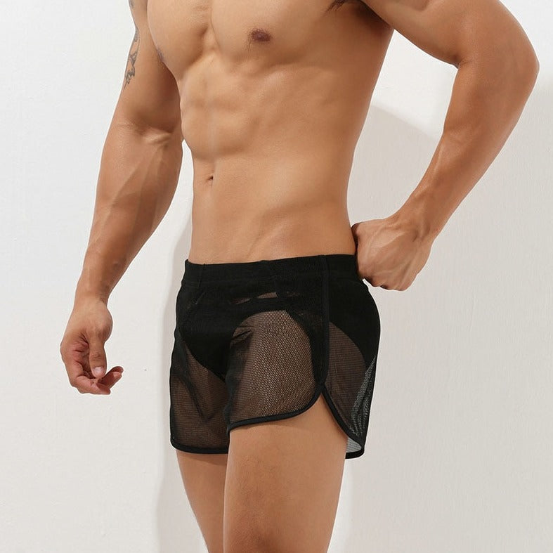 sexy gay man in black Gay Swimwear | Men's Sheer Swim Trunks - pridevoyageshop.com - gay men’s underwear and swimwear