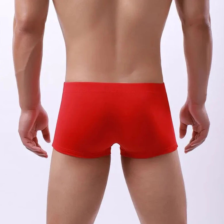 a hot gay man in red Men's 23 Bowtie Swim Trunks - pridevoyageshop.com - gay men’s underwear and swimwear