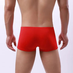 a hot gay man in red Men's 23 Bowtie Swim Trunks - pridevoyageshop.com - gay men’s underwear and swimwear