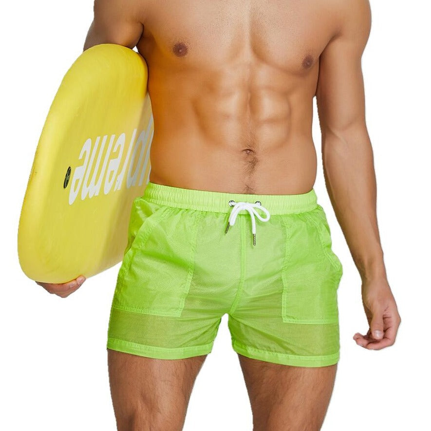 sexy gay man in green Gay Beachwear | Men's Transparent Board Shorts with Pockets - pridevoyageshop.com - gay men’s underwear and swimwear
