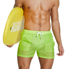 sexy gay man in green Gay Beachwear | Men's Transparent Board Shorts with Pockets - pridevoyageshop.com - gay men’s underwear and swimwear