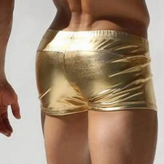 a sexy gay man in gold Men's Liquid Metallic Swim Trunks - pridevoyageshop.com - gay men’s underwear and swimwear