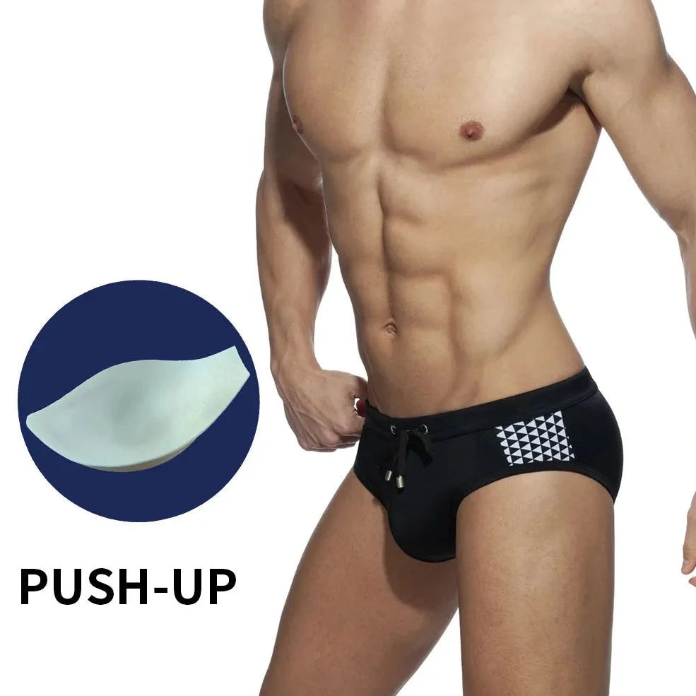 a sexy gay man in black Monochrome Matrix Swim Briefs - pridevoyageshop.com - gay men’s underwear and swimwear