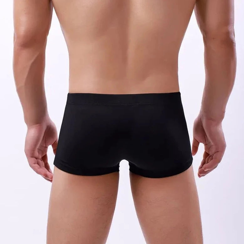 a hot gay man in black Men's 23 Bowtie Swim Trunks - pridevoyageshop.com - gay men’s underwear and swimwear