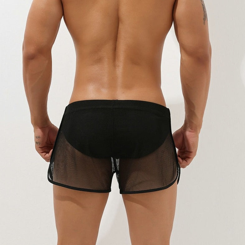 sexy gay man in black Gay Swimwear | Men's Sheer Swim Trunks - pridevoyageshop.com - gay men’s underwear and swimwear