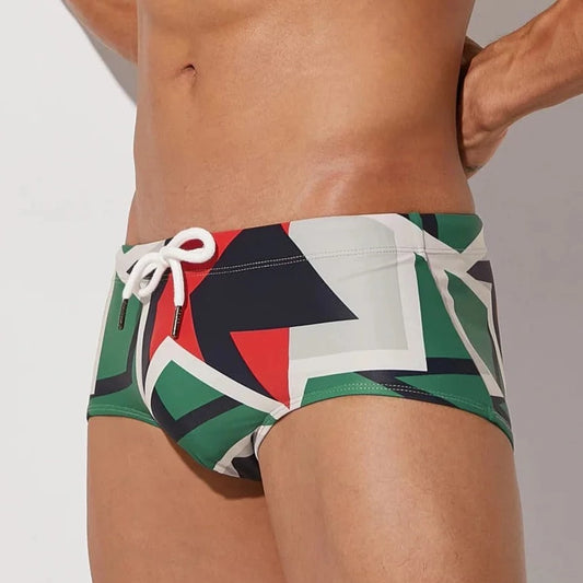 a hot gay man in Men's Mod Geo Swim Trunks - pridevoyageshop.com - gay men’s underwear and swimwear