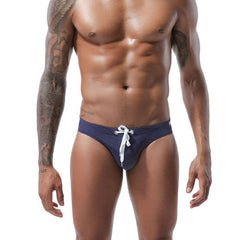 hot gay man in dark blue Gay Swimwear | Men's Bold Bowtie Swim Briefs- pridevoyageshop.com - gay men’s underwear and swimwear