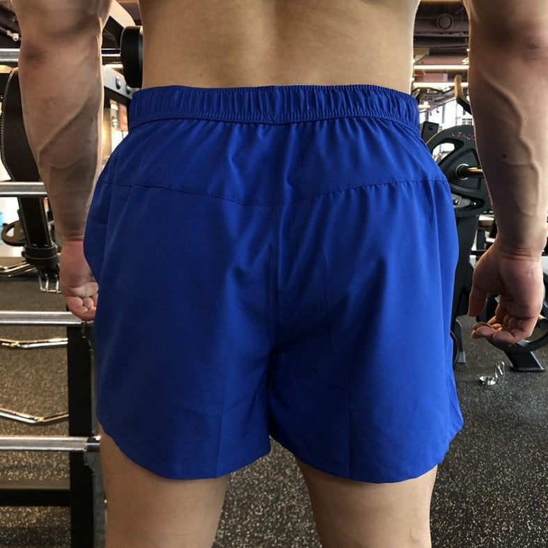 gay hunk in blue Mens Ultra Power Training Shorts | Gay Shorts - Men's Activewear, gym short, sport shorts, running shorts- pridevoyageshop.com