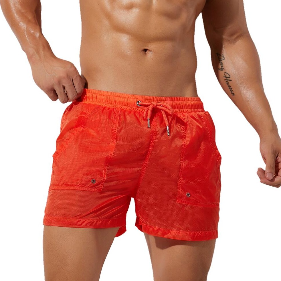 sexy gay man in orange Gay Beachwear | Men's Transparent Board Shorts with Pockets - pridevoyageshop.com - gay men’s underwear and swimwear