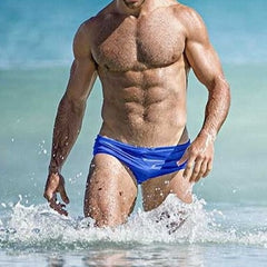 sexy gay man in blue Gay Swimwear | Men's Bold Solid Swim Briefs- pridevoyageshop.com - gay men’s underwear and swimwear