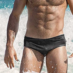 sexy gay man in black Gay Swimwear | Men's Bold Solid Swim Briefs- pridevoyageshop.com - gay men’s underwear and swimwear
