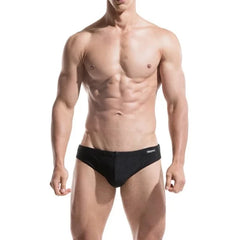 a sexy gay man in black DESMIIT Solid Color Swim Briefs - pridevoyageshop.com - gay men’s underwear and swimwear
