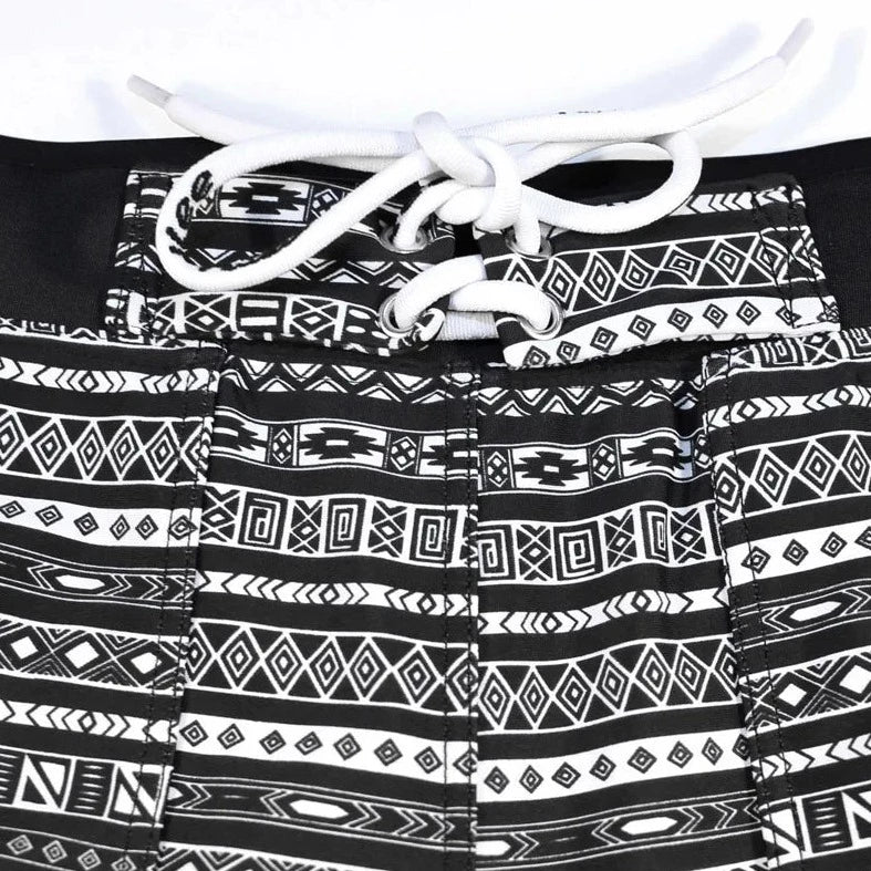 details of a hot man in Aztec Tribal Tight Board Shorts - pridevoyageshop.com - gay men’s underwear and swimwear
