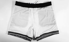 details of a hot man in Aztec Tribal Tight Board Shorts - pridevoyageshop.com - gay men’s underwear and swimwear