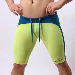 a hot gay man in green Brave Person Two Toned Knee High Gym Shorts - pridevoyageshop.com - gay men’s underwear and swimwear