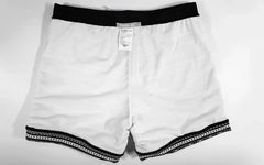 details of a hot man in Aztec Tribal Tight Board Shorts - pridevoyageshop.com - gay men’s underwear and swimwear