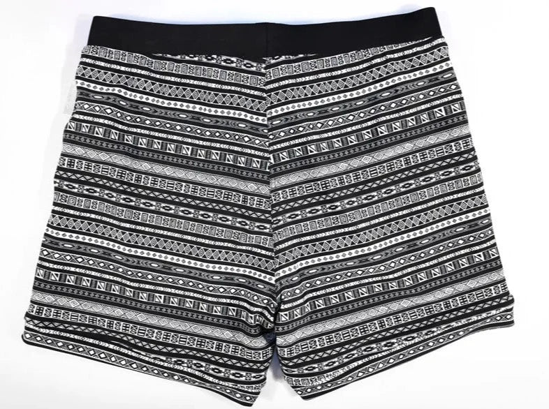 details of a hot man in Aztec Tribal Tight Board Shorts - pridevoyageshop.com - gay men’s underwear and swimwear