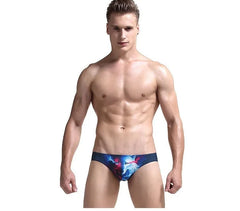 a hot man in Men's Wild Animal Print Bikini Briefs - pridevoyageshop.com - gay men’s underwear and swimwear