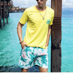 a handsome gay guy in Breeze Bloom Board Shorts - pridevoyageshop.com - gay men’s underwear and swimwear