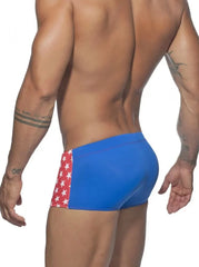 a hot gay man in red Stars Tight Square Cut Swim Trunks - pridevoyageshop.com - gay men’s underwear and swimwear