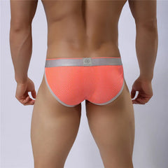 a hot gay man in Orange Brave Person Gay Men's Sideshow Briefs - pridevoyageshop.com - gay men’s underwear and swimwear