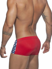 a hot gay man in blue Stars Tight Square Cut Swim Trunks - pridevoyageshop.com - gay men’s underwear and swimwear