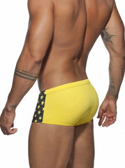 a hot gay man in black Stars Tight Square Cut Swim Trunks - pridevoyageshop.com - gay men’s underwear and swimwear