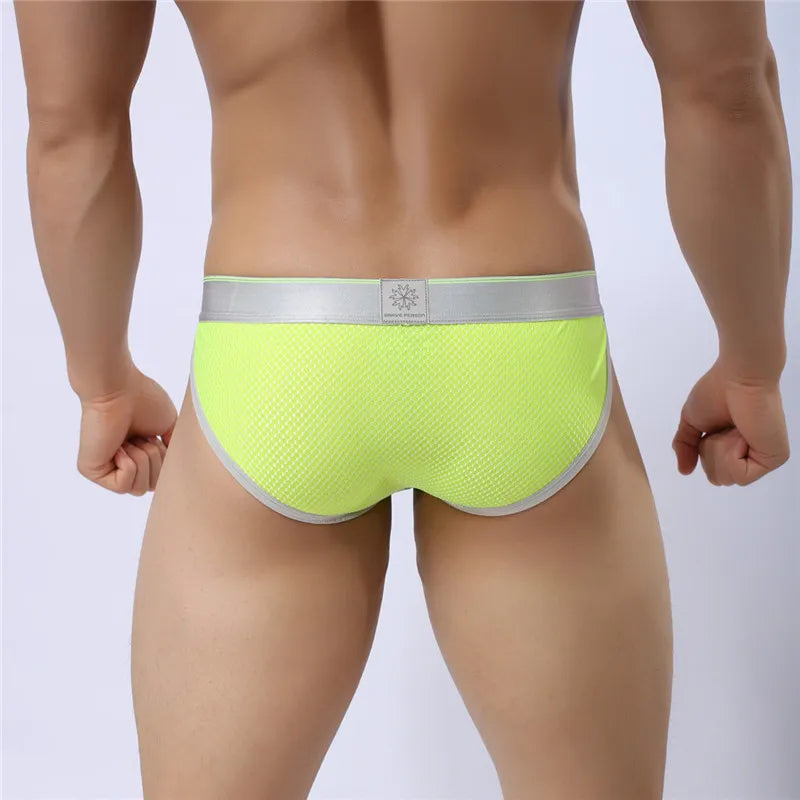a hot gay man in Fluorescent green Brave Person Gay Men's Sideshow Briefs - pridevoyageshop.com - gay men’s underwear and swimwear
