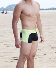 hot gay man in black and yellow Gay Swimwear & Beachwear | Quick Dry Aqua Shape Swim Trunks - pridevoyageshop.com - gay men’s underwear and swimwear