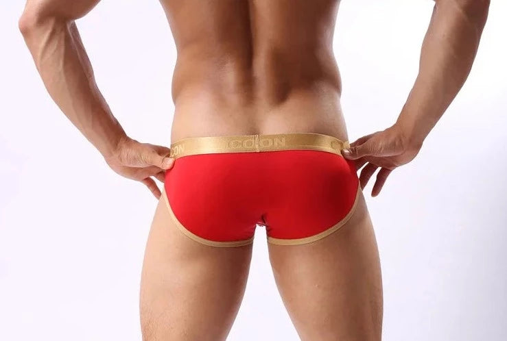 a hot gay man in red COCKCON Barely There Briefs - pridevoyageshop.com - gay men’s underwear and activewear