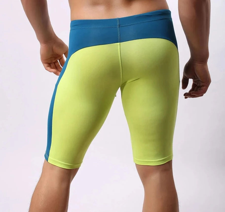 a hot gay man in green Brave Person Two Toned Knee High Gym Shorts - pridevoyageshop.com - gay men’s underwear and swimwear