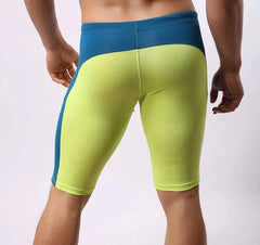 a hot gay man in green Brave Person Two Toned Knee High Gym Shorts - pridevoyageshop.com - gay men’s underwear and swimwear