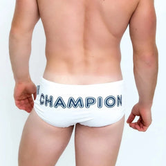a hot daddy in Muscle Daddy Champion Swim Briefs - pridevoyageshop.com - gay men’s underwear and swimwear