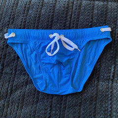 details of blue Gay Swimwear | Men's Bold Bowtie Swim Briefs- pridevoyageshop.com - gay men’s underwear and swimwear