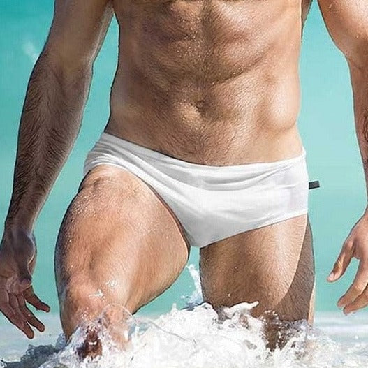 sexy gay man in white Gay Swimwear | Men's Bold Solid Swim Briefs- pridevoyageshop.com - gay men’s underwear and swimwear