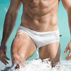 sexy gay man in white Gay Swimwear | Men's Bold Solid Swim Briefs- pridevoyageshop.com - gay men’s underwear and swimwear