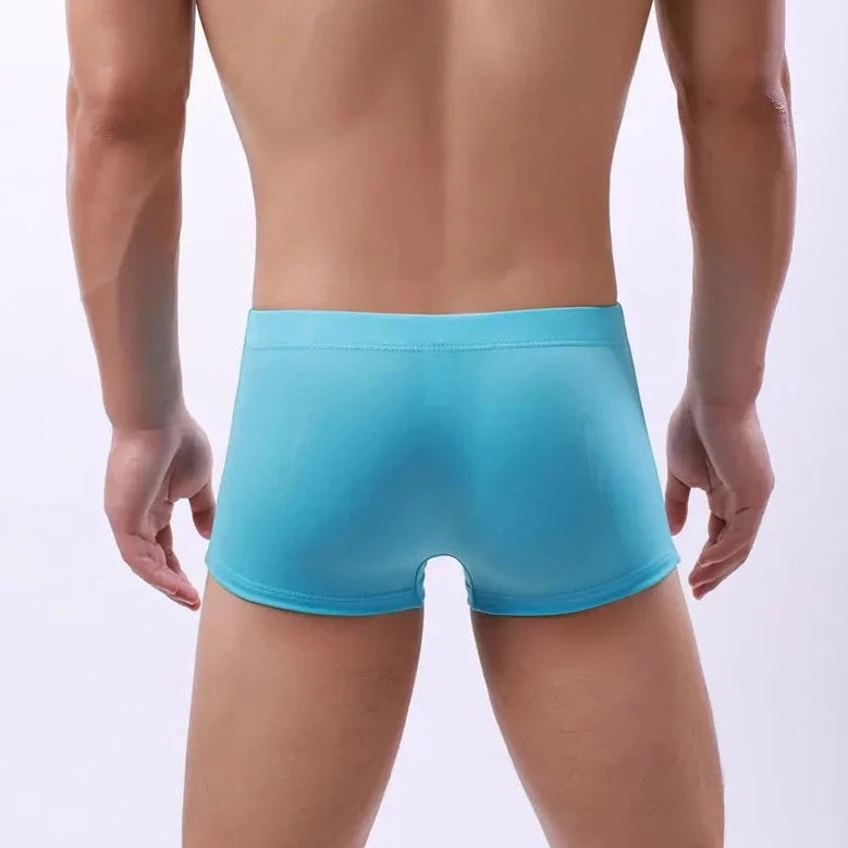 a hot gay man in sky blue Men's 23 Bowtie Swim Trunks - pridevoyageshop.com - gay men’s underwear and swimwear