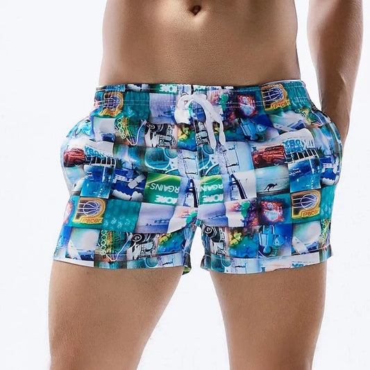 a hot gay man in blue Postcard Grid Board Shorts - pridevoyageshop.com - gay men’s underwear and swimwear