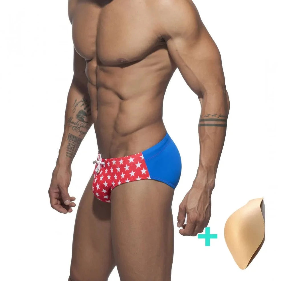 a hot gay man in red Men's Bowtie Stars Swim Briefs - pridevoyageshop.com - gay men’s underwear and swimwear